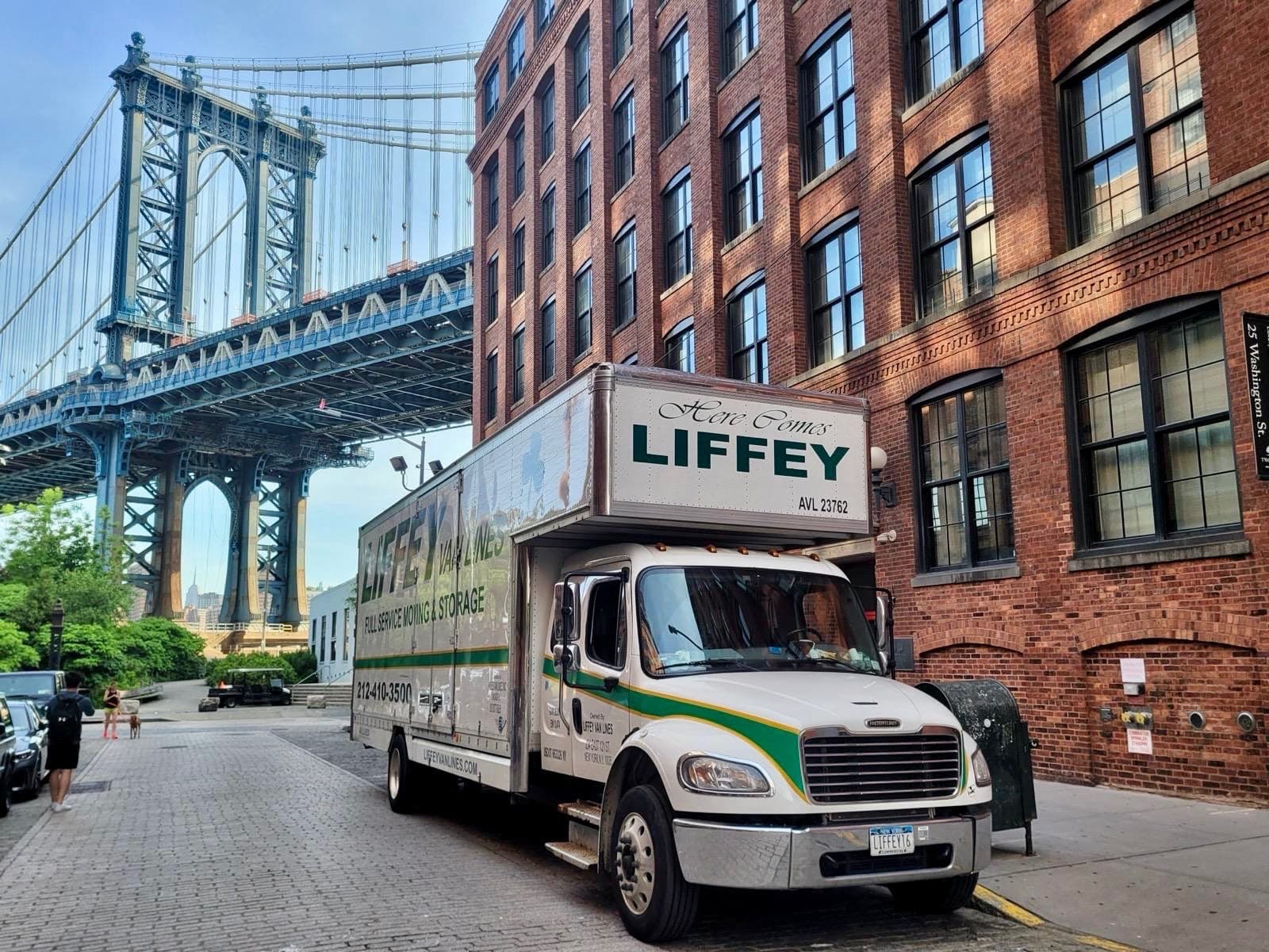 Liffey Van Lines crew moving in New York City near the Brooklyn Bridge